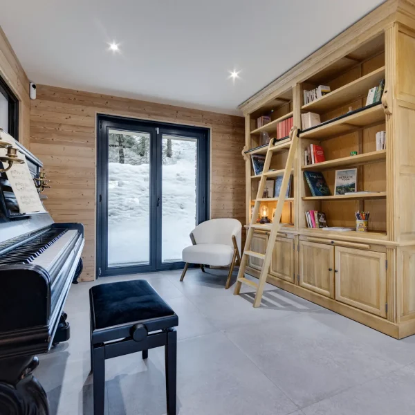 Living rooms & spaces at the chalet 10 chalet with piano